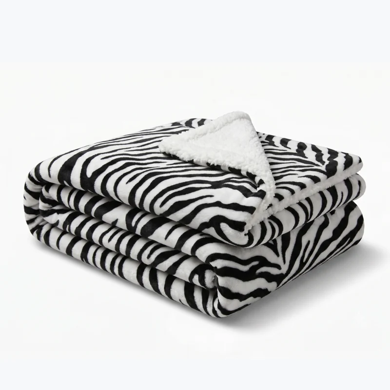 Couette réversible tempérée, blanche et noire - Collection Safari